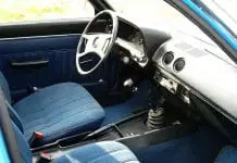Kodėl daug automobilių neturi centrinio porankio vairuotojo alkūnei?