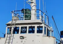 Kas yra tie diskai ant kai kurių laivų langų?